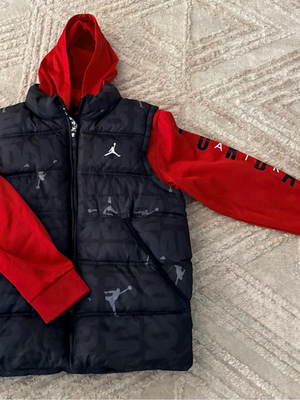 Jordan Black Puffer Vest with Red Hoodie Sleeves